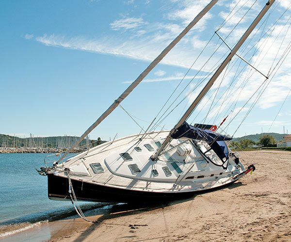 A sloop lying on the beach